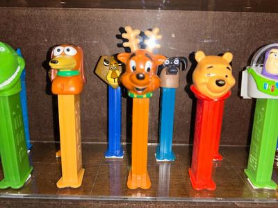 DISPLAY CASE LOADED WITH PEZ DISPENSERS