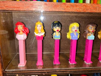 DISPLAY CASE LOADED WITH PEZ DISPENSERS