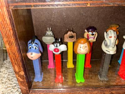 DISPLAY CASE LOADED WITH PEZ DISPENSERS