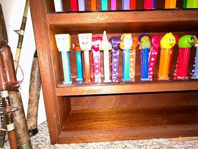 CLEVERLY MADE DISPLAY CASE FILLED WITH PEZ DISPENSERS