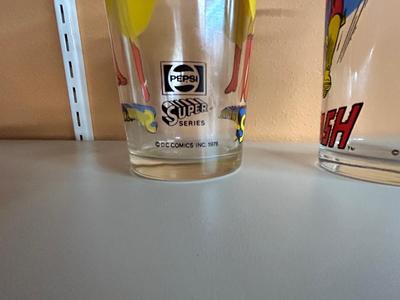 1976 FLASH AND SUPERGIRL DRINKING GLASSES