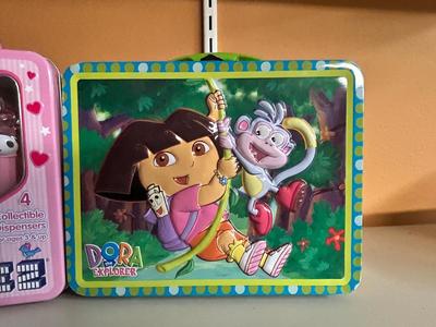 DORA THE EXPLORER, ARTHUR LJNCH TINS AND HELLO KITTY PEZ TIN