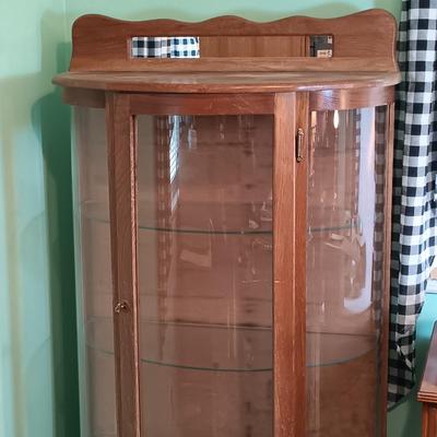 LOT 30: Vintage Curved Glass Curio Cabinet