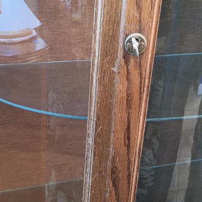 LOT 46: Vintage Curved Glass Curio Cabinet