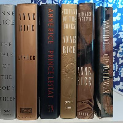 LOT 140: Large Lot of Books with Bookshelf Featuring Anne Rice, Janet Evanovich, Ann Cleeves & More