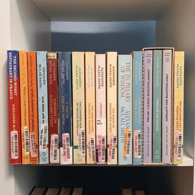 LOT 140: Large Lot of Books with Bookshelf Featuring Anne Rice, Janet Evanovich, Ann Cleeves & More