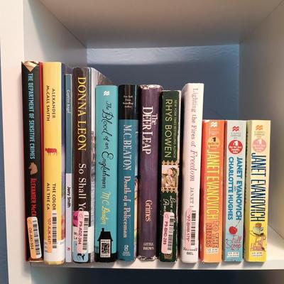 LOT 140: Large Lot of Books with Bookshelf Featuring Anne Rice, Janet Evanovich, Ann Cleeves & More