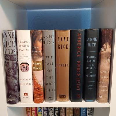 LOT 140: Large Lot of Books with Bookshelf Featuring Anne Rice, Janet Evanovich, Ann Cleeves & More