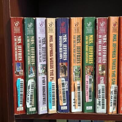 LOT 141: Large Collection of Mystery Novels with Bookshelf Featuring Ngaio Marsi, Martha Grimes, Emily Brightwell & More