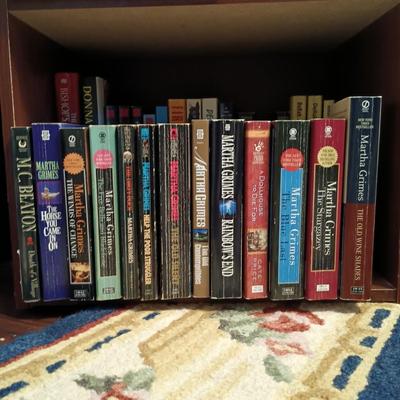 LOT 141: Large Collection of Mystery Novels with Bookshelf Featuring Ngaio Marsi, Martha Grimes, Emily Brightwell & More