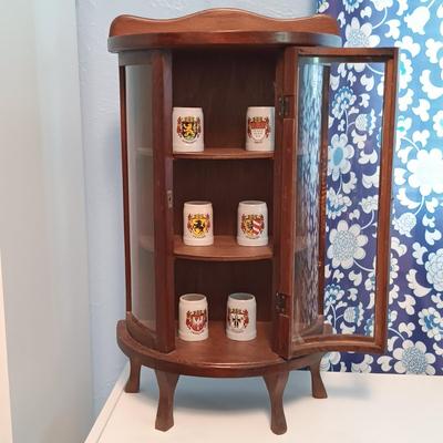 LOT 142: Miniature Curved Glass Curio Cabinet with Tiny German Steins