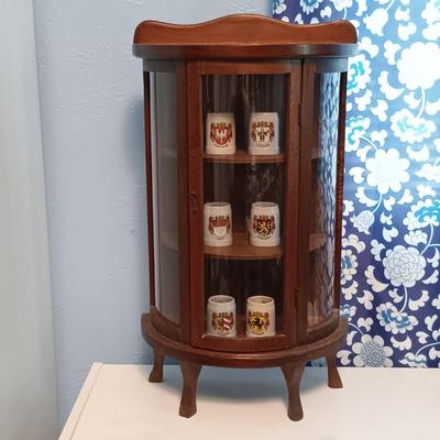 LOT 142: Miniature Curved Glass Curio Cabinet with Tiny German Steins