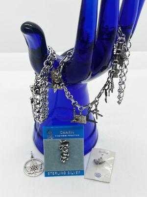 LOT 219J: Assorted Sterling Bracelets and Charms - 40 Grams( didn't weigh the 2 on packaging)