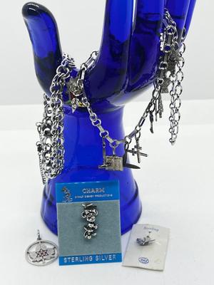 LOT 219J: Assorted Sterling Bracelets and Charms - 40 Grams( didn't weigh the 2 on packaging)