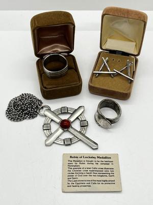 LOT 261J: Eclectic Jewelry Lot: Robin of Lockley Pewter Celtic Cross with Amber Center, Sterling Pierced Earrings and Two Rings - Sized...