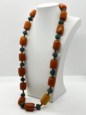 LOT 275J: Egyptian Ball Bead and Tubular Amber Necklace - 30"