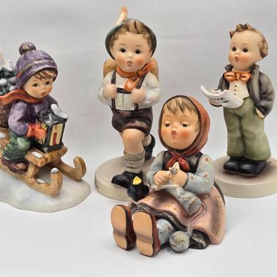 LOT 27D: Variety of Hummel Figurines Including Ride Into Christmas, School Boy, Happy Pastime, & Soloist
