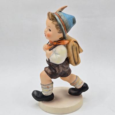 LOT 27D: Variety of Hummel Figurines Including Ride Into Christmas, School Boy, Happy Pastime, & Soloist