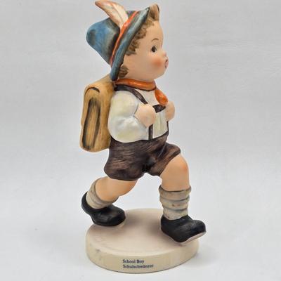 LOT 27D: Variety of Hummel Figurines Including Ride Into Christmas, School Boy, Happy Pastime, & Soloist