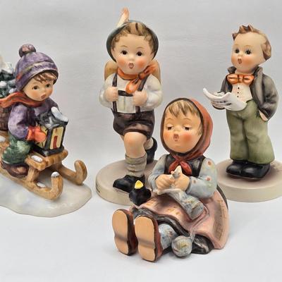 LOT 27D: Variety of Hummel Figurines Including Ride Into Christmas, School Boy, Happy Pastime, & Soloist