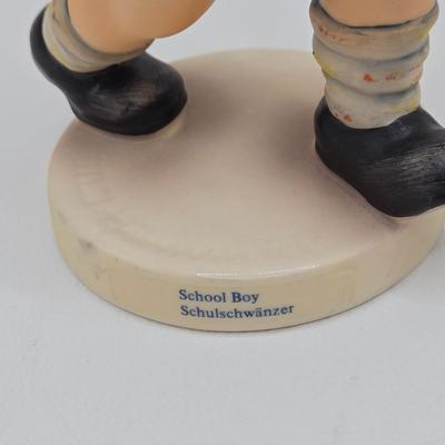 LOT 27D: Variety of Hummel Figurines Including Ride Into Christmas, School Boy, Happy Pastime, & Soloist
