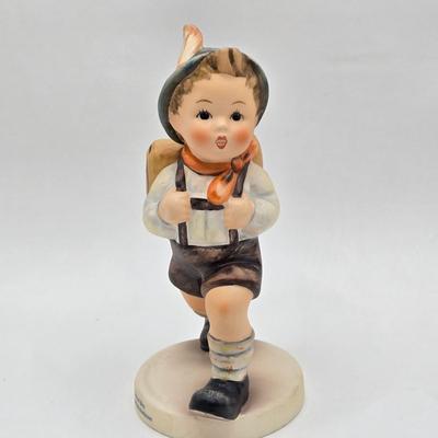 LOT 27D: Variety of Hummel Figurines Including Ride Into Christmas, School Boy, Happy Pastime, & Soloist