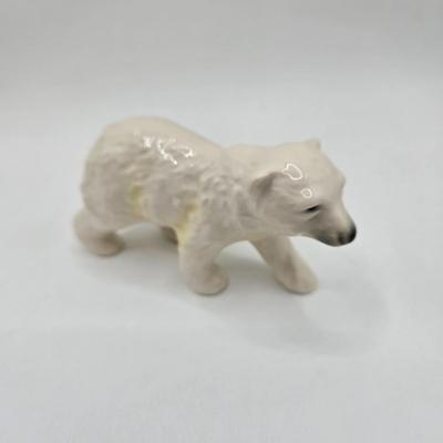 LOT 28D: Goebel Fox, Polar Bear, and Playful Bear Cubs