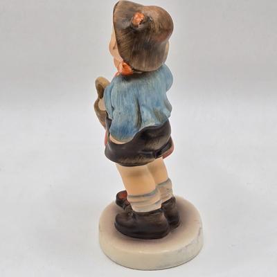 LOT 31D: Goebel Hummel Figurines Including Night Watchman, Little Pastry Cook, Little Hiker, Surprise AKA Hansel & Gretel, and Little...