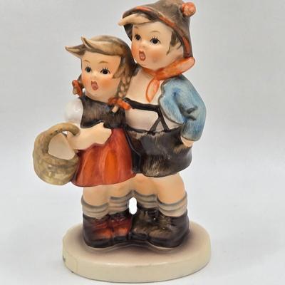 LOT 31D: Goebel Hummel Figurines Including Night Watchman, Little Pastry Cook, Little Hiker, Surprise AKA Hansel & Gretel, and Little...