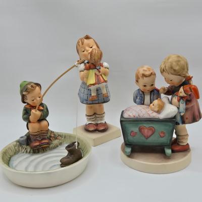 LOT 33D: Hummel Figurines Including Kiss Me, Blessed Event, and Just Fishing