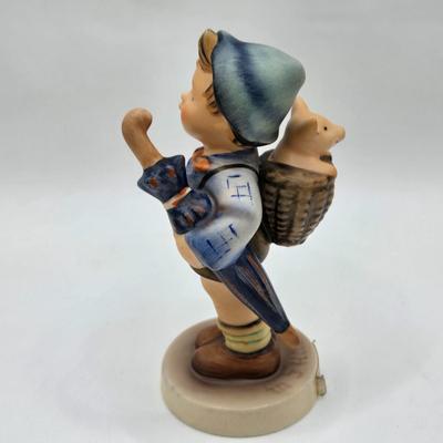 LOT 35D: Hummel Figurines Including Home From Market, Playmates, A nap, Angel with Accordion AKA Joyous News