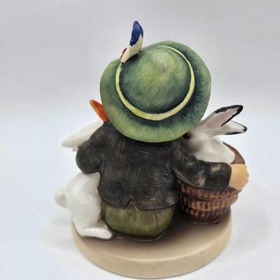 LOT 35D: Hummel Figurines Including Home From Market, Playmates, A nap, Angel with Accordion AKA Joyous News