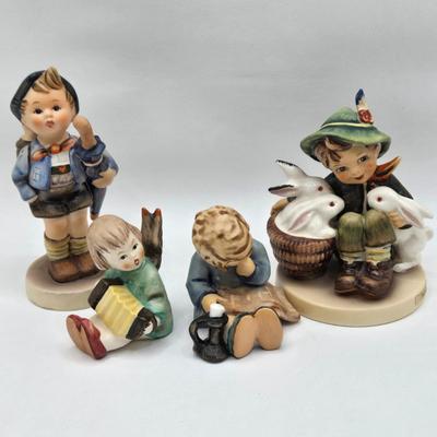 LOT 35D: Hummel Figurines Including Home From Market, Playmates, A nap, Angel with Accordion AKA Joyous News