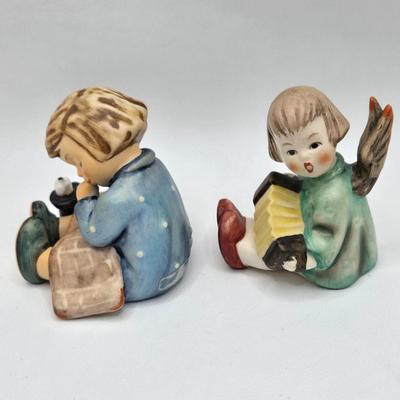 LOT 35D: Hummel Figurines Including Home From Market, Playmates, A nap, Angel with Accordion AKA Joyous News