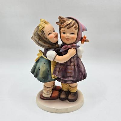 LOT 36D: Goebel Hummel Figurines Including Telling Her Secret, Trumpet Boy, Singing Lessons, Sensitive Hunter, and Merry Wanderer