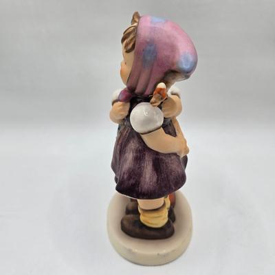 LOT 36D: Goebel Hummel Figurines Including Telling Her Secret, Trumpet Boy, Singing Lessons, Sensitive Hunter, and Merry Wanderer