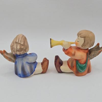 LOT 38D: Hummels Including Goose Girl, Feeding Time, Angel with Trumpet, and Angel with Lute