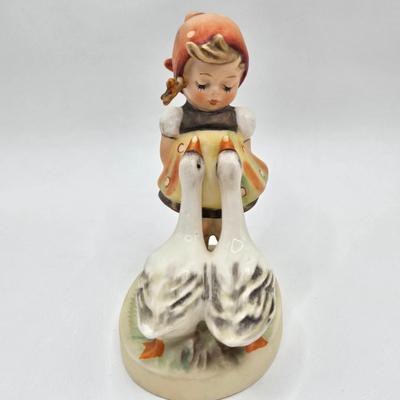 LOT 38D: Hummels Including Goose Girl, Feeding Time, Angel with Trumpet, and Angel with Lute