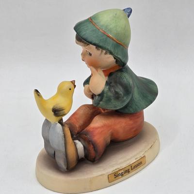 LOT 39D: Hummels Including Sweet Music, Puppy Love, 2 Little Sweepers, and Singing Lessons