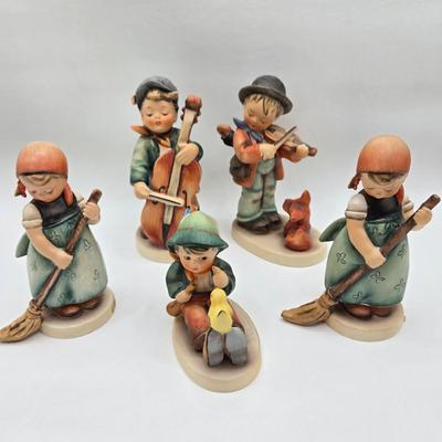 LOT 39D: Hummels Including Sweet Music, Puppy Love, 2 Little Sweepers, and Singing Lessons
