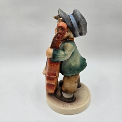 LOT 39D: Hummels Including Sweet Music, Puppy Love, 2 Little Sweepers, and Singing Lessons