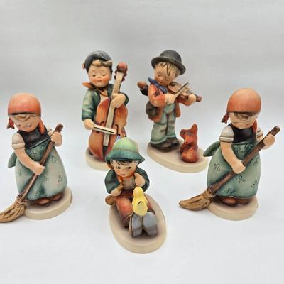 LOT 39D: Hummels Including Sweet Music, Puppy Love, 2 Little Sweepers, and Singing Lessons