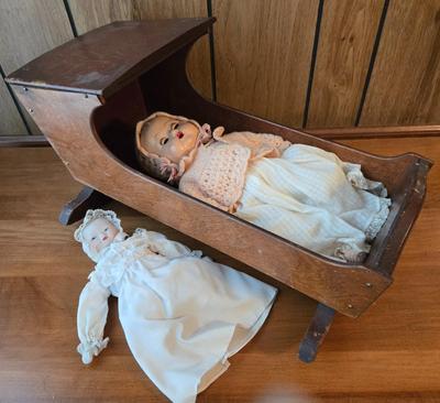 LOT 47D: Wooden Cradle with Music Box, Imperial Crown Toy Baby Doll, and Porcelain Baby Doll
