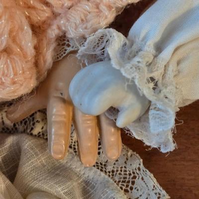 LOT 47D: Wooden Cradle with Music Box, Imperial Crown Toy Baby Doll, and Porcelain Baby Doll