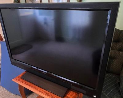 LOT 64L: Vizio TV with Remote and Wooden Table