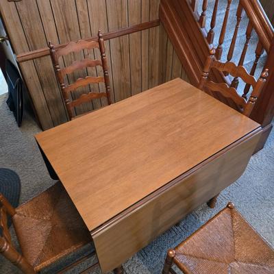 LOT 73D: Beautiful Vintage Drop Leaf Table with 4 Rush Seat, Ladder Back Chairs