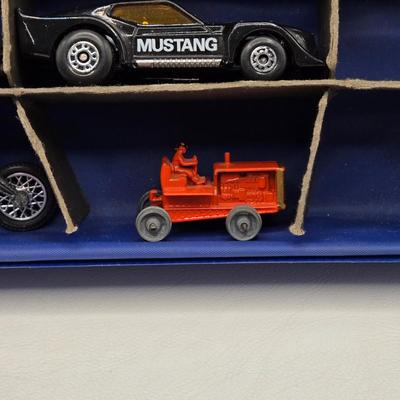 LOT 101X: Vintage Matchbox Series Carrying Case with Cars, Trucks, and More Inside