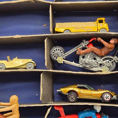 LOT 101X: Vintage Matchbox Series Carrying Case with Cars, Trucks, and More Inside
