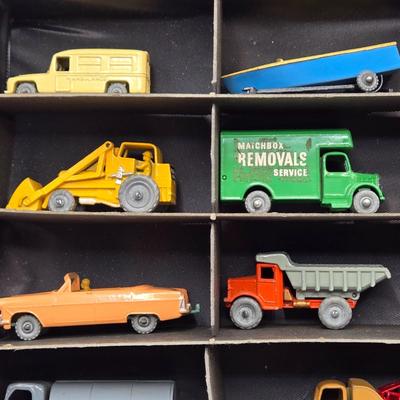 LOT 101X: Vintage Matchbox Series Carrying Case with Cars, Trucks, and More Inside