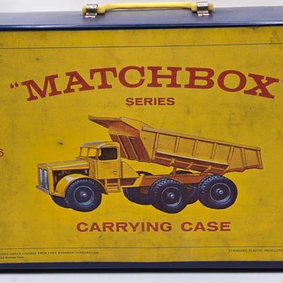 LOT 101X: Vintage Matchbox Series Carrying Case with Cars, Trucks, and More Inside